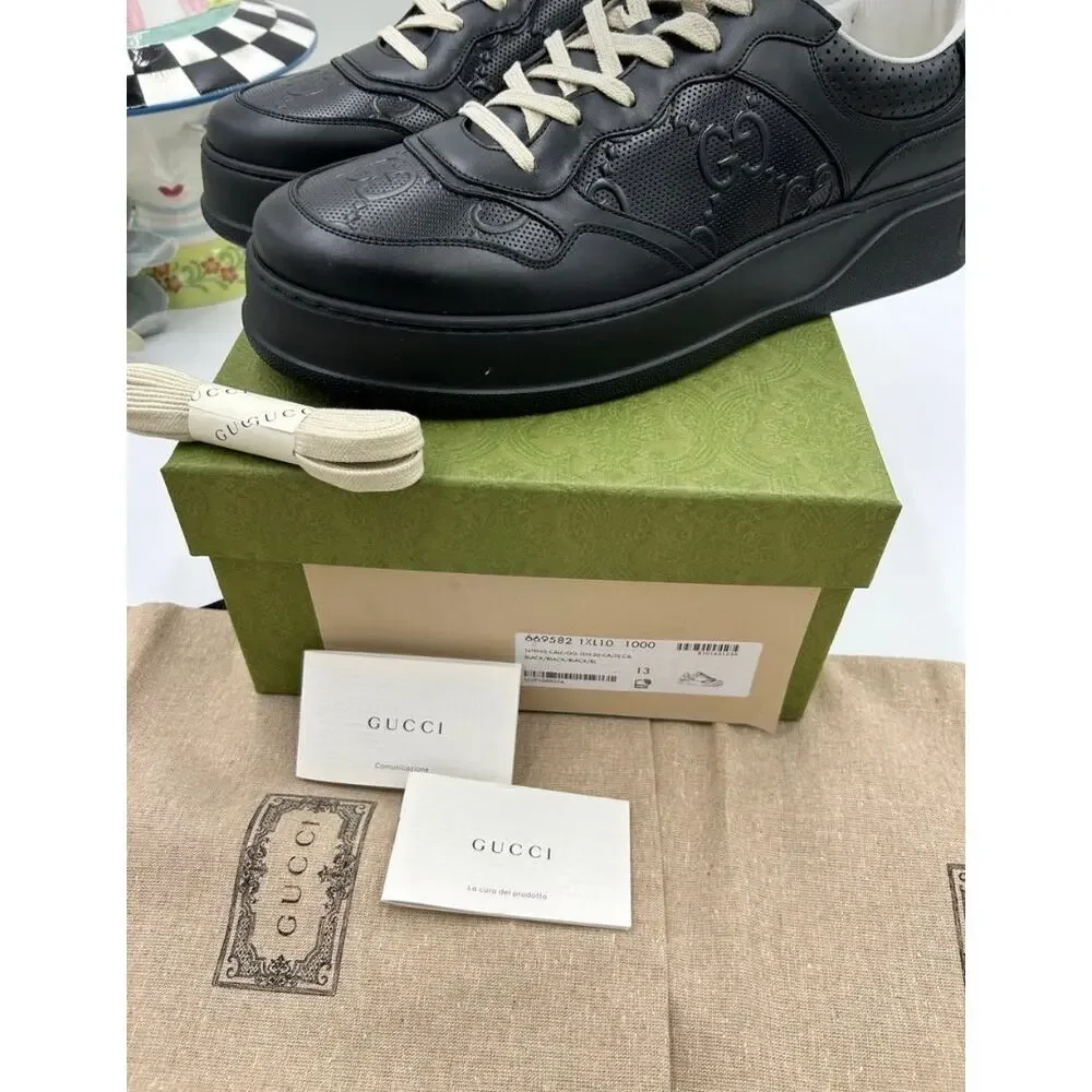 Men's Gucci, GG embossed leather sneakers size 13 fits 13.5 US made in Italy